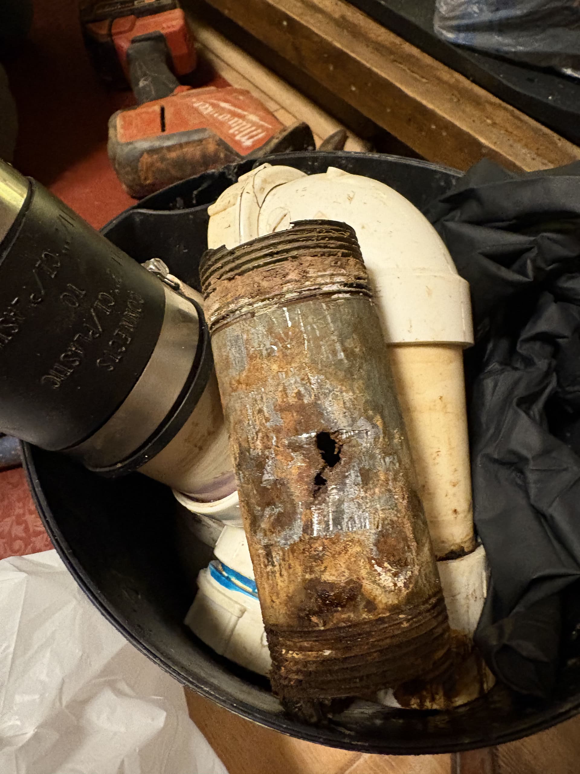 Rusted Cast Iron Sink Drain Replaced with Clean PVC Piping image