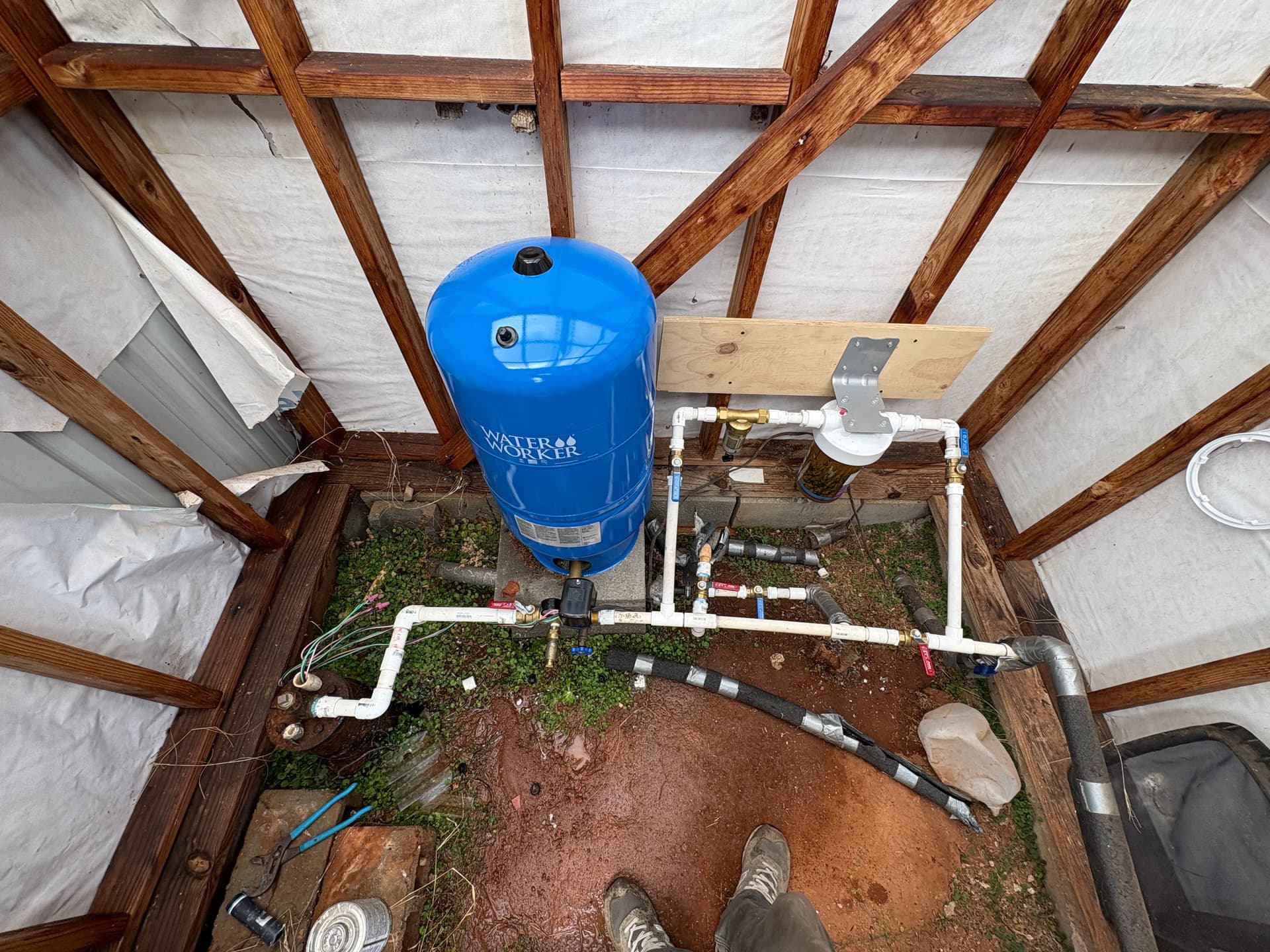 Reliable Well Tank Installation for Optimal Farm Water Pressure image
